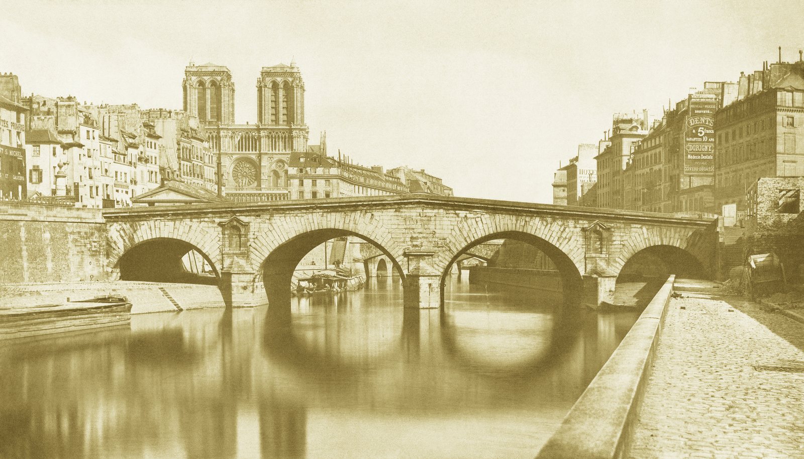 The old Pont Saint-Michel photographed in 1857